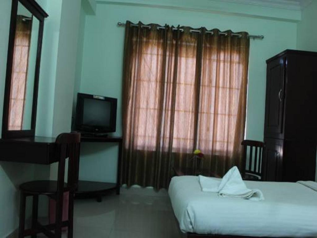 Sm Regency Kochi Rom bilde
